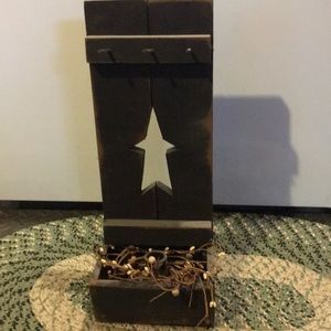 Primitive wooden candleholder
